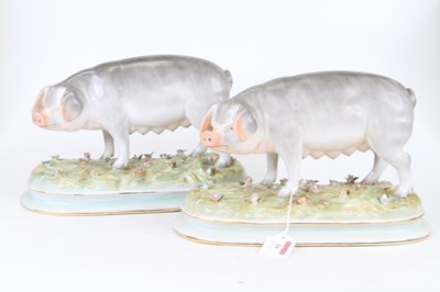 Lot 16 - A pair of 20th century porcelain models of...