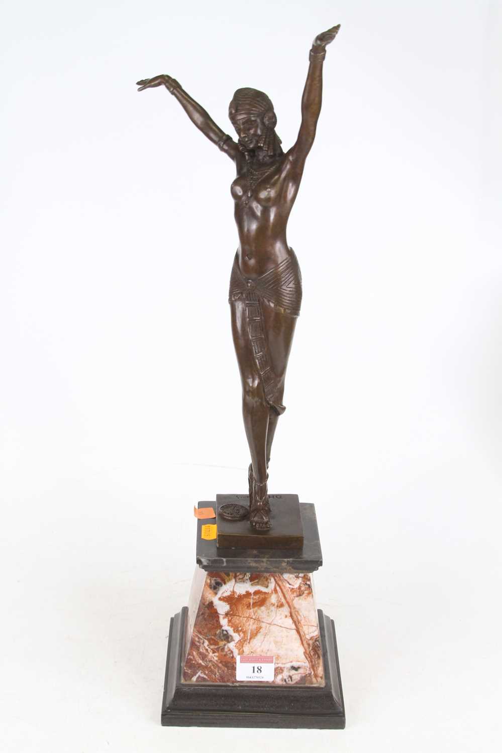 Lot 18 - An Art Deco style bronzed figure of a lady,...