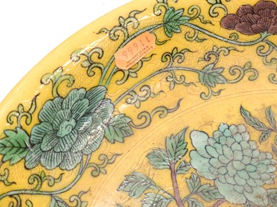 Lot 6 - A Chinese yellow glazed dish, decorated with...