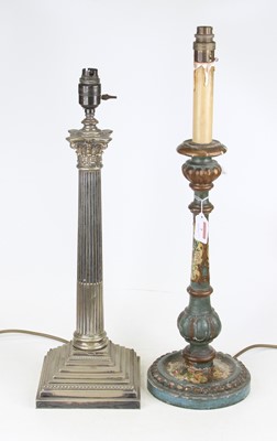Lot 7 - A silver plated table lamp in the form of a...