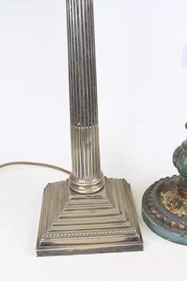 Lot 7 - A silver plated table lamp in the form of a...