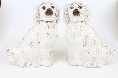 Lot 24 - A pair of Victorian Staffordshire pottery...