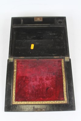Lot 27 - A Victorian black lacquered writing slope, the...