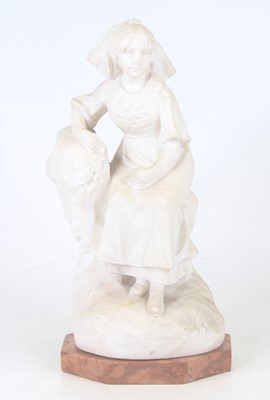 Lot 36 - A carved marble figure of a seated girl,...