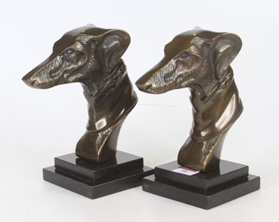 Lot 48 - A pair of bronzed metal models of greyhound...