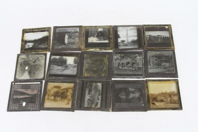 Lot 89 - A collection of glass photographic slides, to...