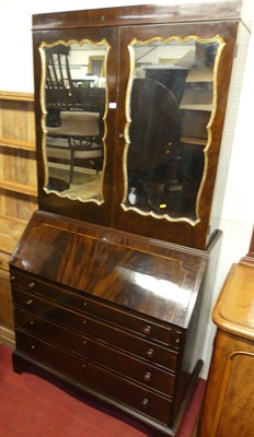 Lot 1128 - A Georgian style flame mahogany and inlaid...