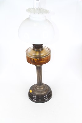 Lot 111 - A Victorian oil lamp, having an opaque glass...