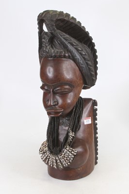 Lot 133 - An African carved hardwood head and shoulders...