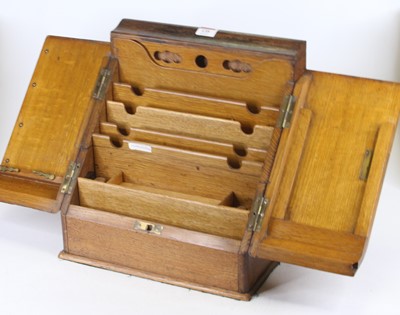 Lot 135 - A Victorian light oak table-top stationery...