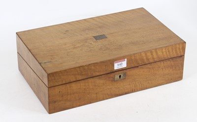 Lot 142 - A Victorian walnut writing slope, the hinged...
