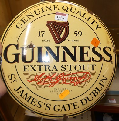 Lot 1096 - Convex enamel advertising sign for Guinness...