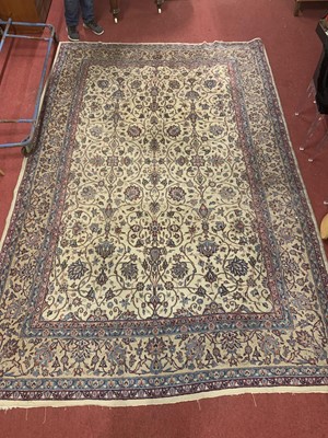 Lot 1163 - A Persian woollen pale ground Tabriz rug, the...