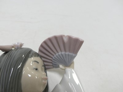Lot 172 - A Lladro porcelain figure of a Geisha girl,...
