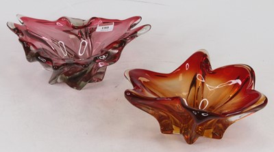 Lot 180 - A cranberry tinted art glass dish, of abstract...