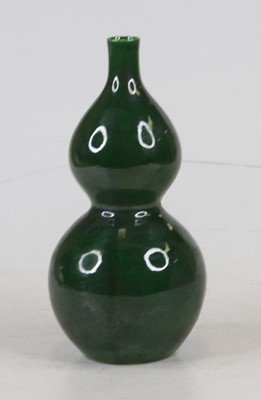 Lot 190 - A Chinese green glazed porcelain vase, of...