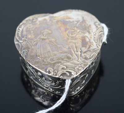 Lot 272 - A continental silver heart shaped pill box,...