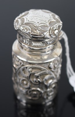 Lot 273 - A George V silver and embossed cylindrical...