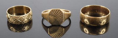 Lot 284 - A 9ct gold signet ring; together with a plain...