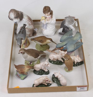 Lot 202 - A Lladro porcelain figure of a puppy, modelled...