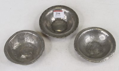 Lot 216 - An Arts & Crafts hammer-beaten pewter dish,...