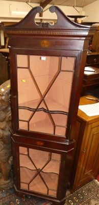 Lot 1188 - A mahogany freestanding corner cupboard,...