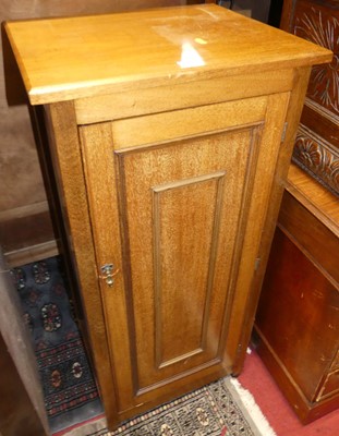 Lot 1189 - An Edwardian walnut single door music cabinet,...