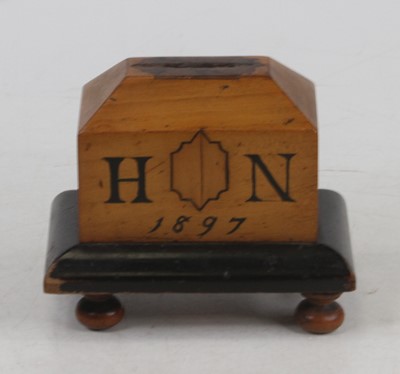 Lot 398 - A Victorian treen moneybox, bearing monogram...