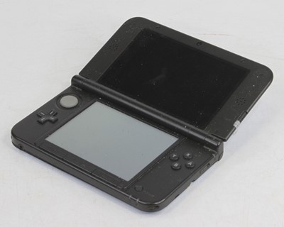 Lot 404 - A Nintendo 3DS XL hand held video game console