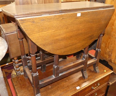 Lot 1202 - A joined oak gateleg table, having single end...