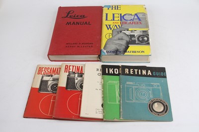 Lot 407 - A collection of books and guides relating to...