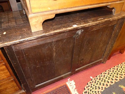 Lot 1205 - An oak hinged twin panelled blanket chest,...