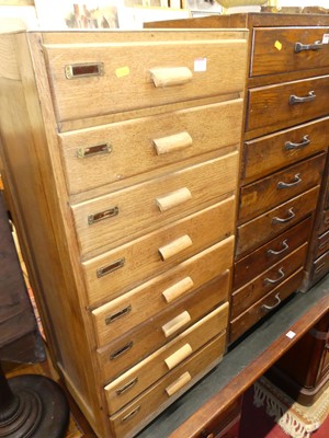 Lot 1216 - A 1930s blond oak eight-drawer office index...