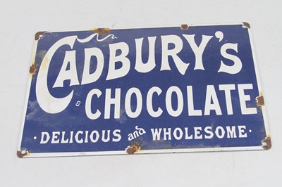 Lot 423 - A reproduction Cadbury's Chocolate enamel sign,...