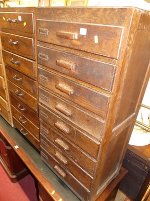 Lot 1218 - A 1920s oak office eight-drawer index filing...