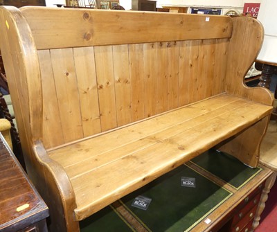 Lot 1236 - A contemporary planked pine three-seater pew,...