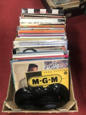 Lot 515 - A collection of vintage LPs and singles to...