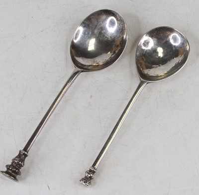 Lot 254 - An antique silver seal topped spoon together...