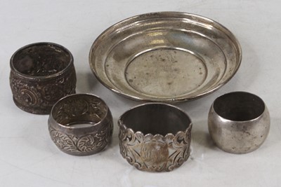 Lot 265 - Four various silver napkin rings together with...