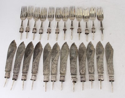 Lot 269 - A collection of silver fish knives and forks,...