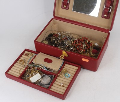 Lot 324 - A faux snakeskin jewellery box and contents of...