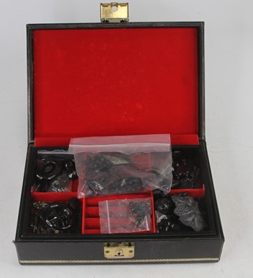 Lot 369 - A black faux leather clad jewellery box...