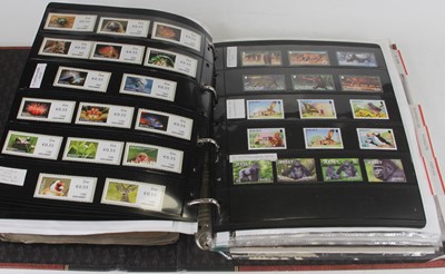 Lot 389 - A collection of assorted mint stamp sets and...