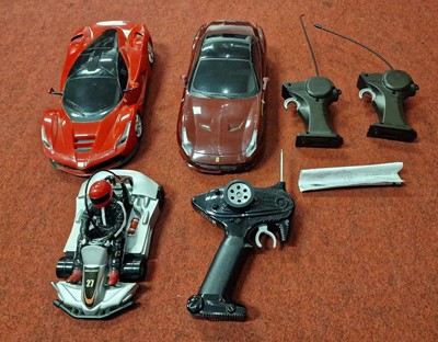 Lot 210 - 2 radio controlled Ferrari models together...