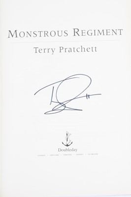 Lot 554 - Pratchett, Terry: Monstrous Regiment, signed...