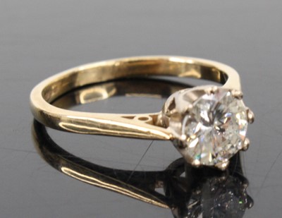 Lot 1267 - A 9ct yellow and white gold diamond solitaire...