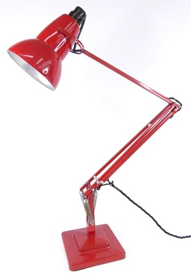 Lot 156 - Herbert Terry - a red painted metal anglepoise...