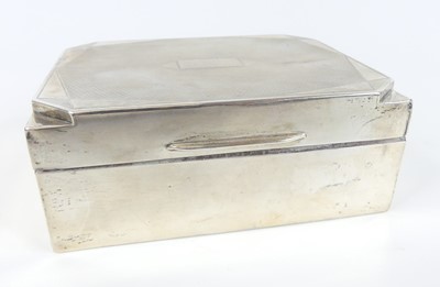 Lot 88 - An Art Deco silver table cigarette box, having...
