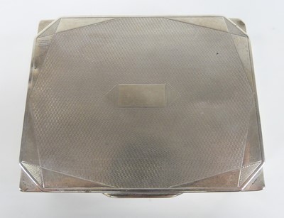 Lot 88 - An Art Deco silver table cigarette box, having...