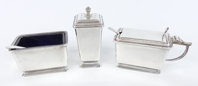 Lot 90 - A late Art Deco silver three-piece condiment...